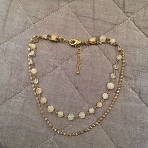 Double strand adjustable choker necklace.